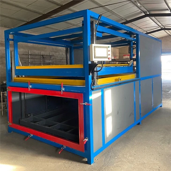 Plastic sheet vacuum forming machine